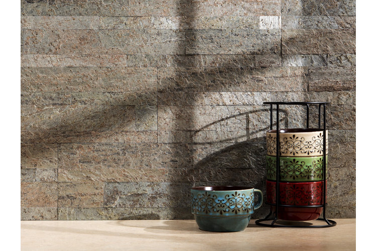 long horizontal stone wall tiles as a kitchen backsplash