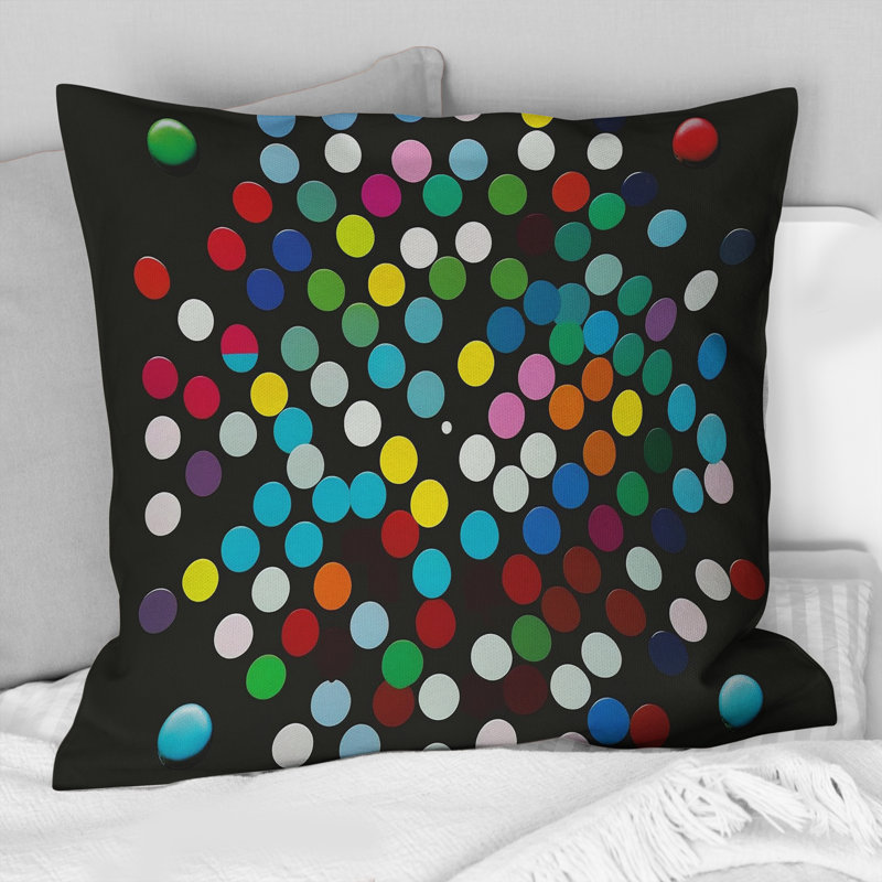 Coussin décoratif imprimé géométrique à code couleur sur fond noir