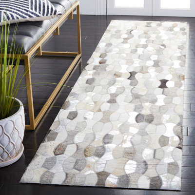 Belday Machine Woven Cowhide Area Rug