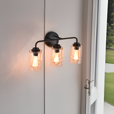 3-light matte black metal wall sconce with glacier clear glass shades, e26 socket indoor vanity light