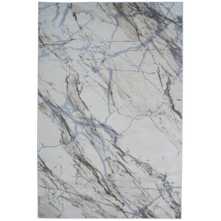Abstract Machine Woven Beige Area Rug