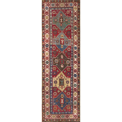 Tapis antique à motif géométrique de style tribal