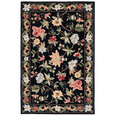 Teppich Detres in Schwarz/Rot/Grün