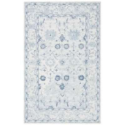Lethe Oriental Handmade Tufted Wool Blue/Ivory Area Rug