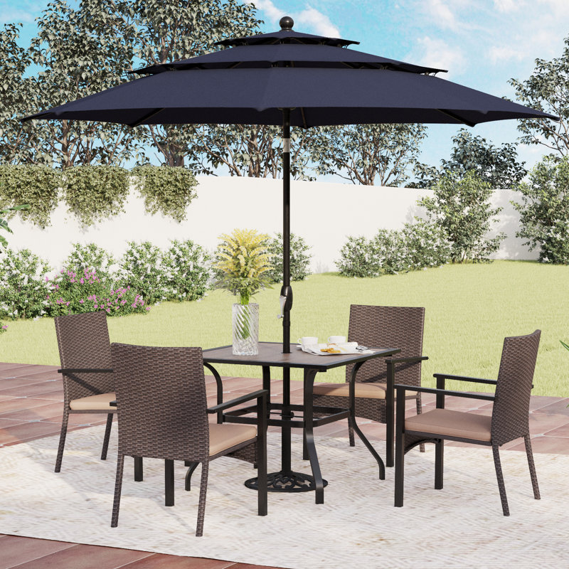 Ensemble repas 4 personnes avec parasol et coussins Leonard