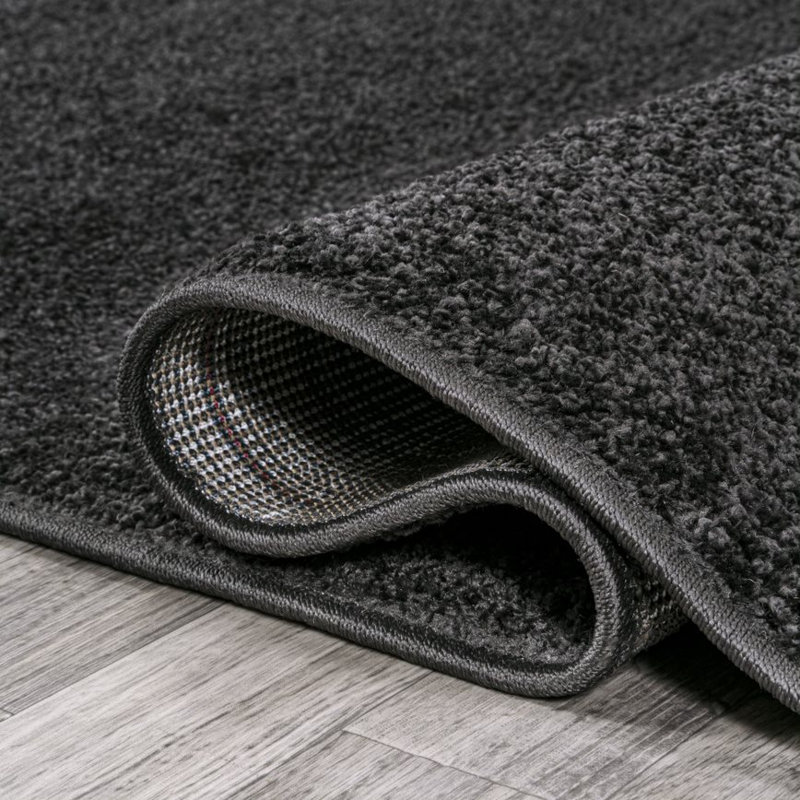 Tapis noir Asaldis, Rectangle 7 pi 9 po x 10 pi