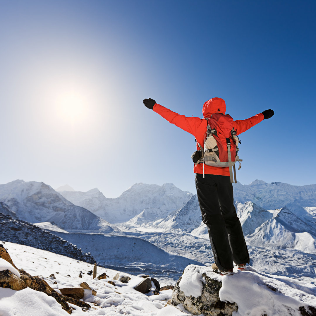 Woman Lifts Her Arms In Victory, Mount Everest National Park von Hadynyah - No Frame Art Prints on Canvas