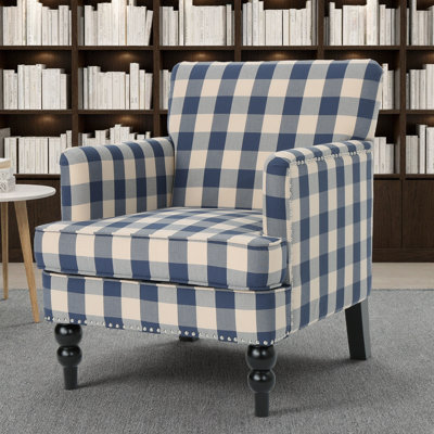 Fauteuil club capitonné Harrison: laissez-vous séduire par l'élégance de votre tissu bleu