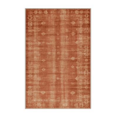 Tapis rose surteint lavable à la machine