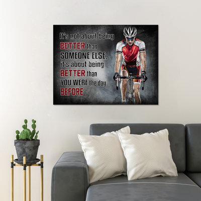 A Man Riding A Bike - It's Not About Being Better Than Someone Else - Wrapped Canvas Textual Art