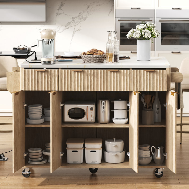 Îlot de cuisine cannelé avec rangement, abattant, prise de courant et plateau en faux marbre, idéal pour les cuisines et les salles à manger modernes.