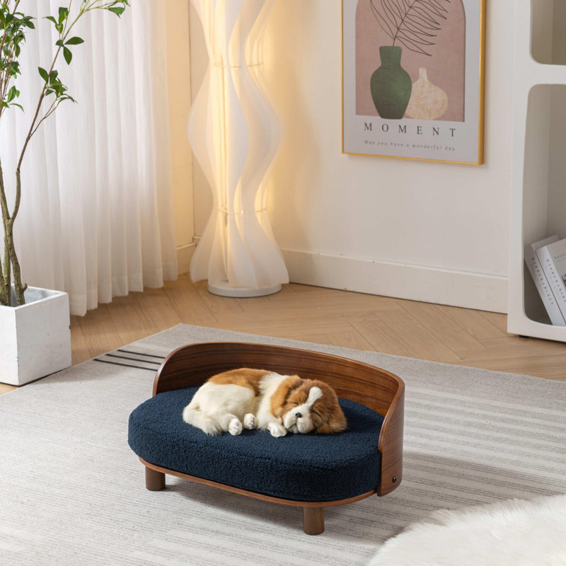 Canapé surélevé pour chien avec pieds en bois massif et dossier en bois cintré, coussin en cachemire, Bleu foncé / noyer