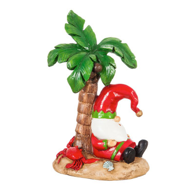 Statue de jardin en forme de GNOME de Noël avec un arbre de Noël