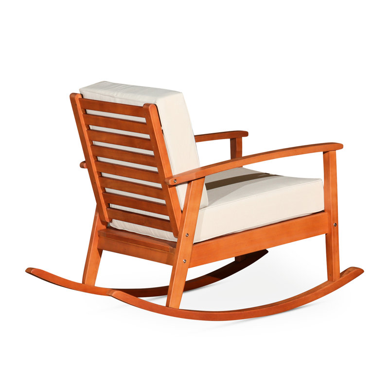 Élégante chaise berçante en eucalyptus, finition huilée naturelle, coussins bordeaux pour un bonheur extérieur