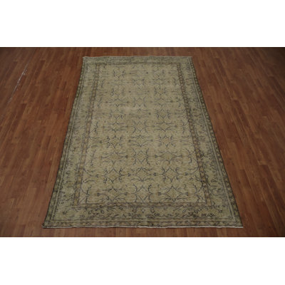 Tapis élégant beige délavé
