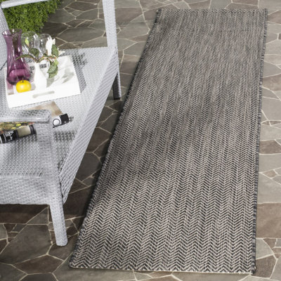 Arneshia Black/Beige Area Indoor/Outdoor Area Rug