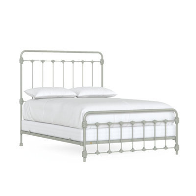 Lit en fer Picket Fence