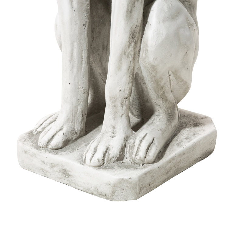 Statue de jardin chien assis