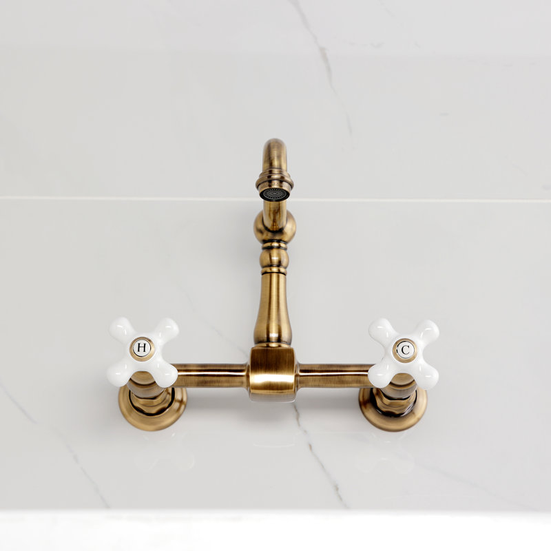 Kingston Brass Heritage Double-Handle 2-Hole Wall-Mount Bridge Kitchen Faucet, Antique Brass