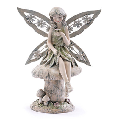 Fairy Sitting On Mushroom With Butterfly