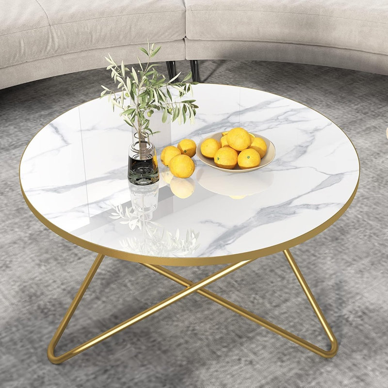 Table basse ronde avec plateau en faux marbre blanc