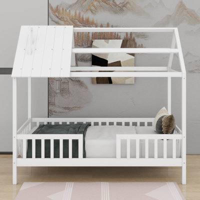 Lit simple en bois avec clôture