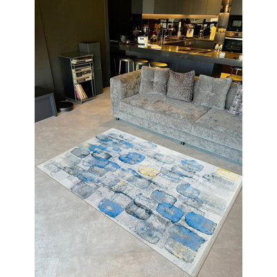 Tapis décoratif moderne à motif abstrait bleu et gris de la collection Barcelona