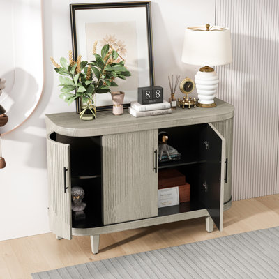 Console en bois de 47,2 pouces de couleur champagne: avec 4 portes et tablettes réglables pour la chambre à coucher, le salon moderne incurvé