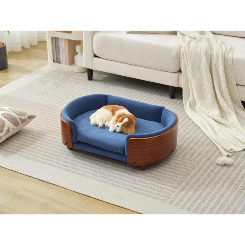Lit pour chien surélevé de style scandinave avec pattes en bois massif et dossier en bois cintré, coussin en cachemire