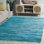 Tapis turquoise en coton tissé à plat à la main Nerys