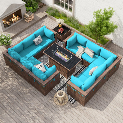 Ensemble de conversation modulaire en rotin Babak avec foyer et table basse