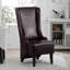 Fauteuil d'appoint à haut dossier en cuir de polyuréthane avec motif à oreilles et pieds en bouleau