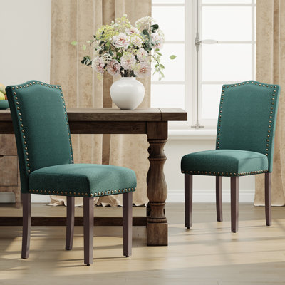 Chaise de salle à manger rembourrée en tissu d'ameublement de 6 po avec pieds en bois massif et garniture cloutée Oakridge