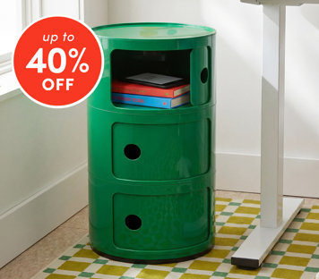 Desk storage up to 40% off featuring green cylindrical storage unit with books next to white desk