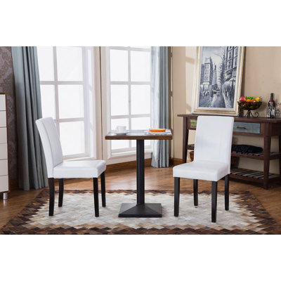 Ensemble de 2 chaises Parson rembourrées en similicuir de style urbain Urban L 21 po x l 16,5 po x H 35,5 po.