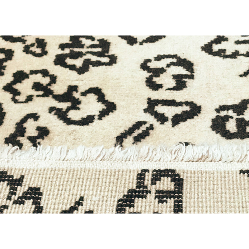 Tapis ivoire noué à la main de haute qualité