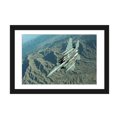 " A US Air Force F-15E Strike Eagle On A Combat Patrol Over Afghanistan " by Stocktrek Images