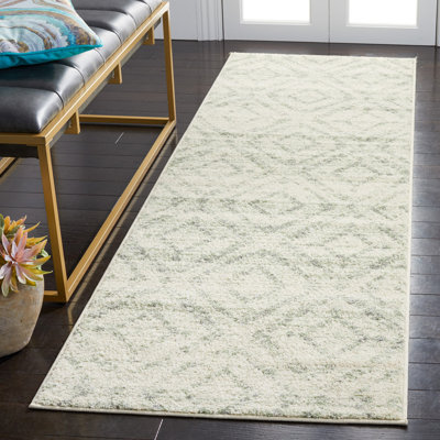 Almus Geometric Ivory/Green Area Rug