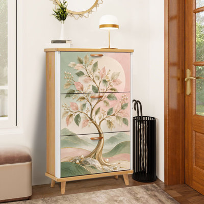 Meuble à chaussures à 3 tiroirs rabattables, élégant motif d'arbre métallique rose et vert avec des accents nacrés. Étagère à chaussures sur pied étroite et discrète, idéale pour une entrée, un corridor, un hall d'entrée, un dressing ou un petit appartement.