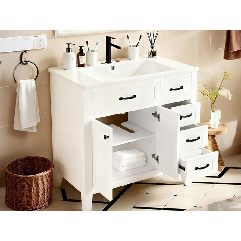 Salle de bain avec lavabo encastré en céramique, armoire simple moderne avec tiroirs et portes