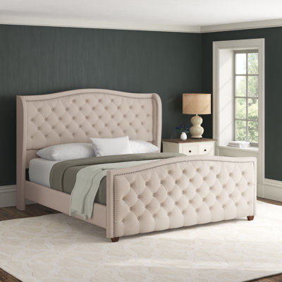 Coleman Upholstered Wingback Bed