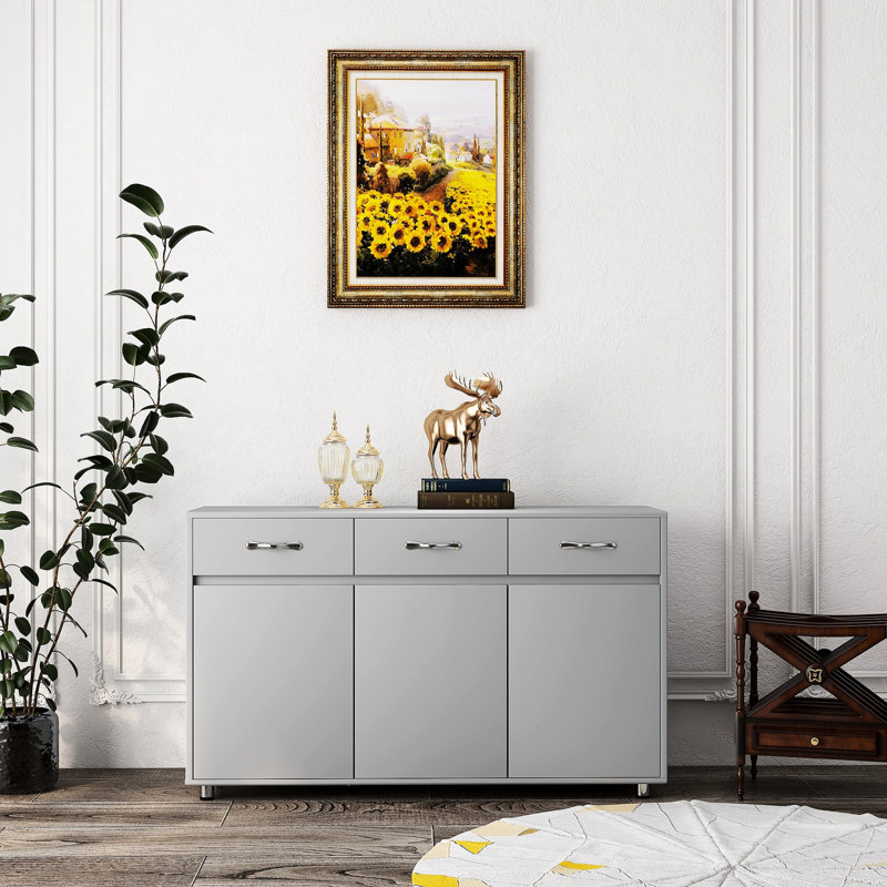 Table d'appoint grise avec 3 portes et différents espaces de rangement pour 2 tablettes pratiques