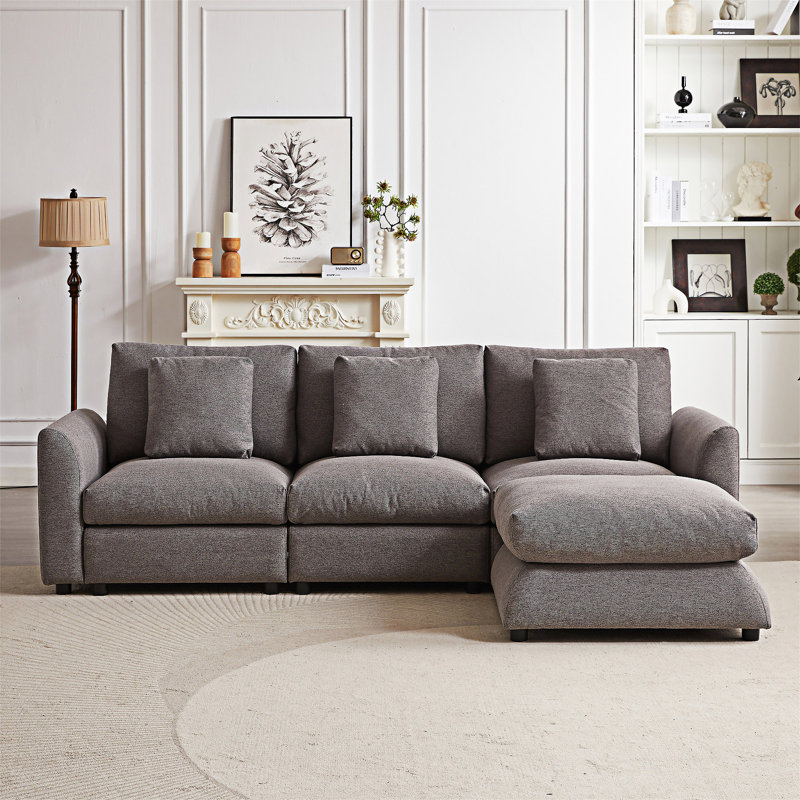 Canapé modulaire avec repose-pieds et trois coussins, Gris