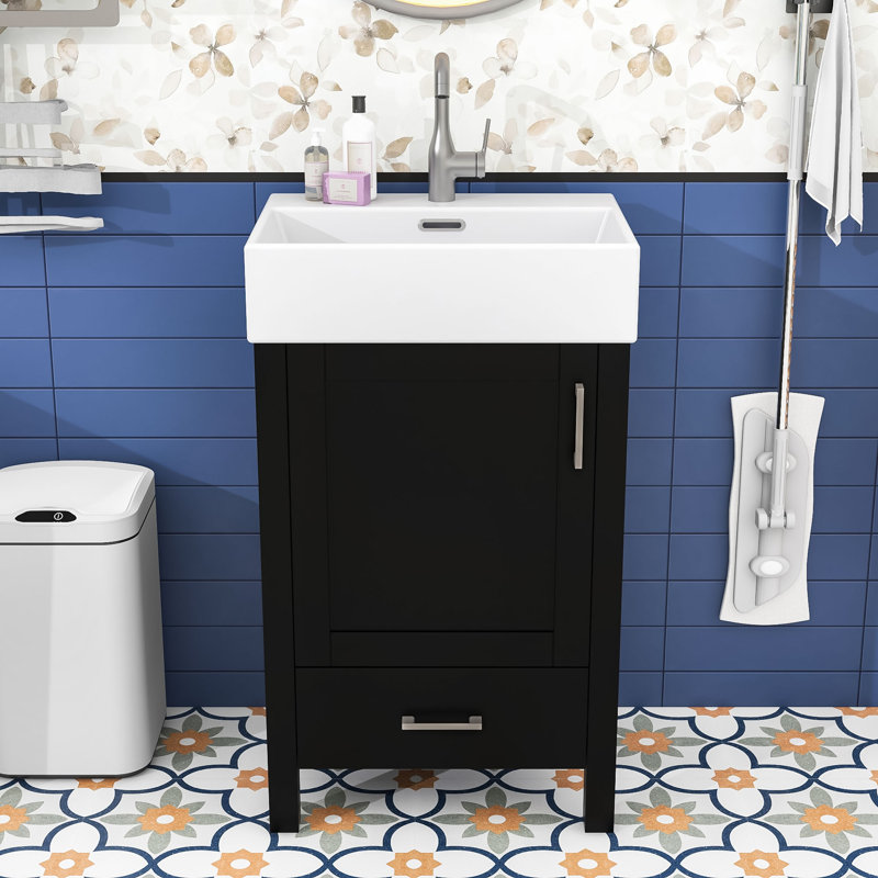 Meuble-lavabo simple moderne à faible encombrement avec lavabo en céramique, rangement spacieux et porte à fermeture en douceur