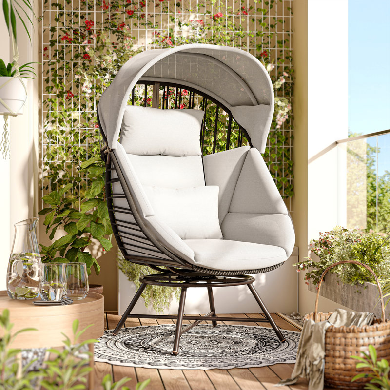 Fauteuil surdimensionné pivotant à 360 ° en rotin avec coussin