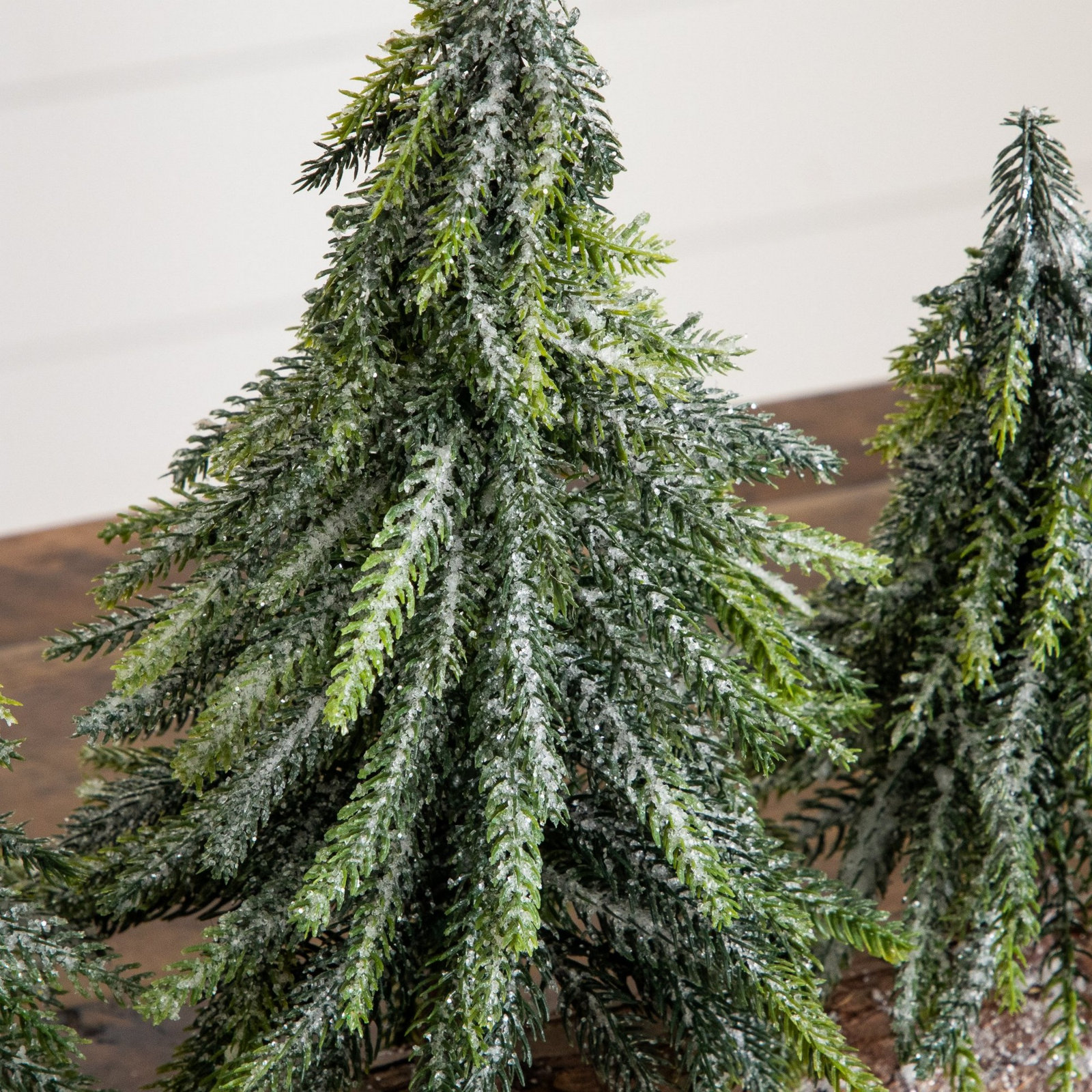 10in. Artificial Snowed Downswept Christmas Tree Trio in Rustic Wooden Log Base