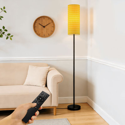 Lampe sur pied avec grille jaune clair et lignes blanches à intensité variable avec télécommande et interrupteur au pied avec abat-jour