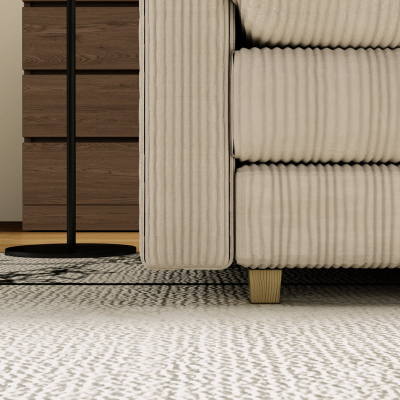 Canapé de salon beige avec assise profonde - Détendez-vous dans un style moderne avec coussins
