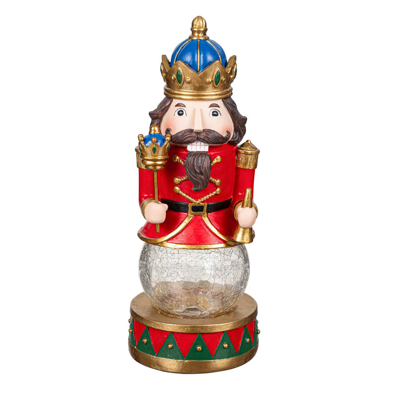 LED Resin Nutcracker with Crackle Glass Globe Table Décor