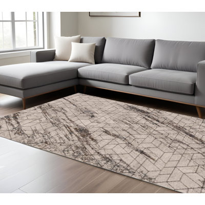 7' X 10' Ivory And Brown Geometric Area Rug